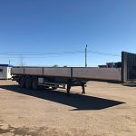 Полуприцеп бортовой открытый Тонар 